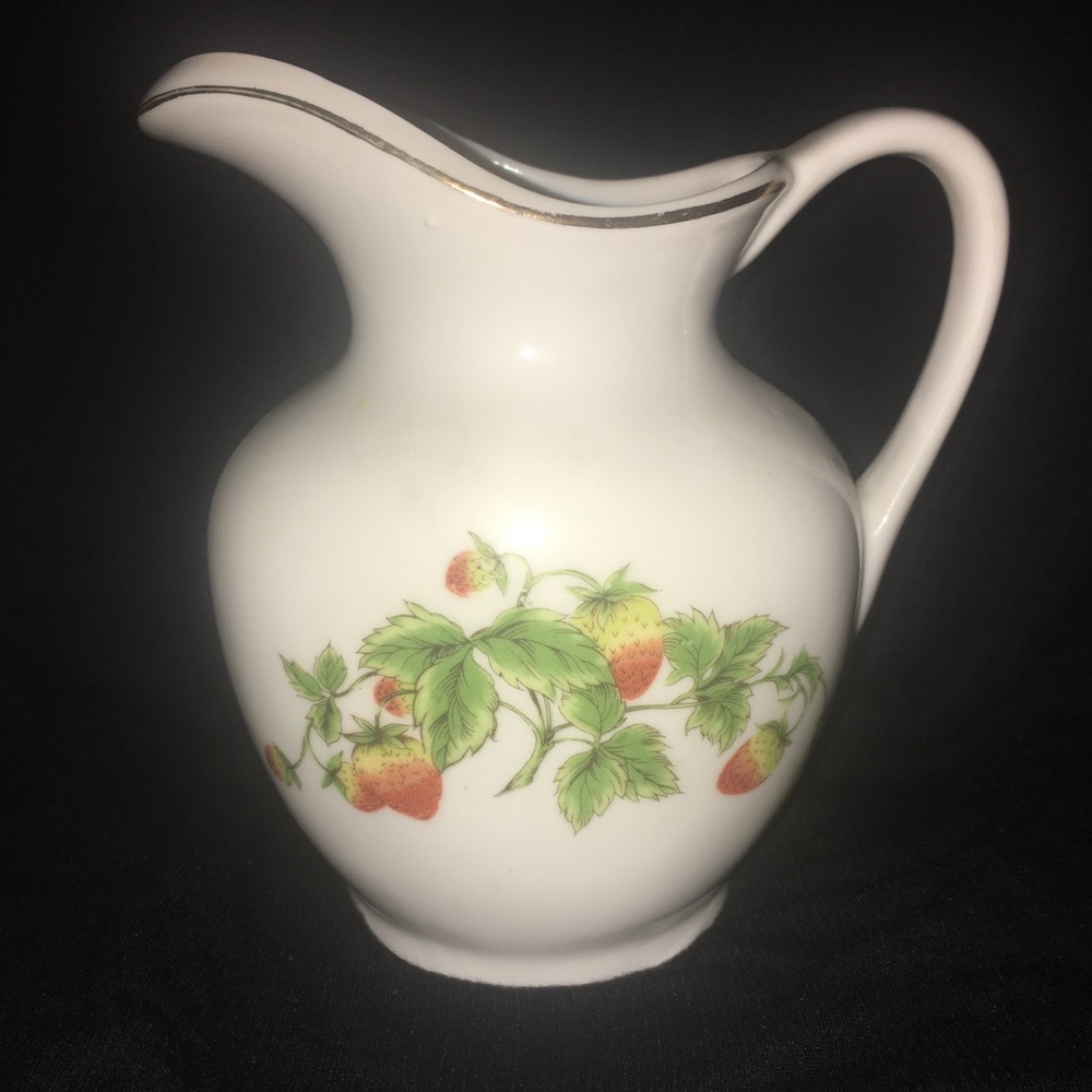 Porcelain decorative pouring jug